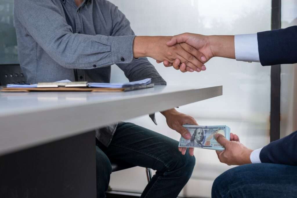 Getting blackmailed and giving money under the table